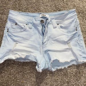 Light denim ripped shorts